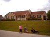 Kids_in_front_of_house
